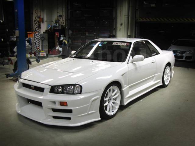 Скайлайн 33 кузов возле дома. Передний бампер ниссан скайлайн r34 a. Nissan skyline r32 обвес bn-sport. Ниссан скайлайн запчасти. Ниссан скайлайн запчасти.