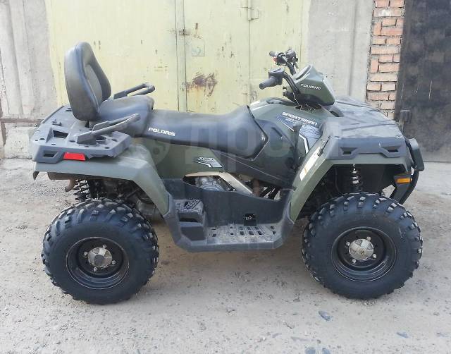 Polaris Sportsman Touring. ,  \,   