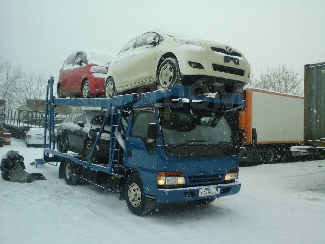 Автотранзит владивосток. Isuzu Elf автовоз. Автовоз Тойота Дюна. Тойота Дюна автовоз 96год. Автовоз Владивосток.