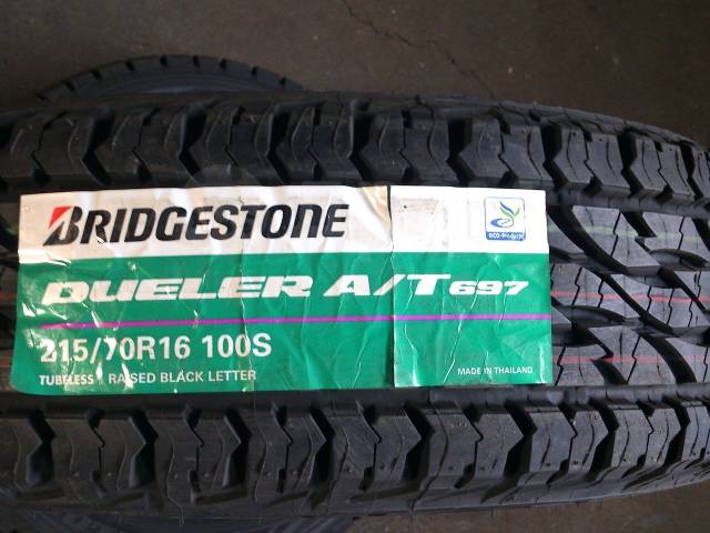 Шины 215 r16c купить. Бриджстоун 697 Dueler a/t. Bridgestone Dueler a/t 215/70 r16. 215/70 R16 Bridgestone Dueler a/t 697. Bridgestone Dueler a/t 697 215/70 r16 100s.