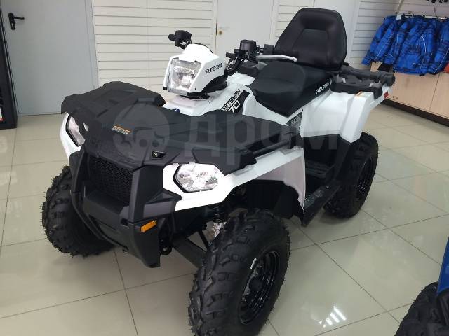 Polaris Sportsman Touring. ,  \,   