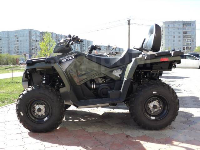 Polaris Sportsman Touring. ,  \,   