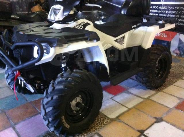 Polaris Sportsman Touring. ,  \,   