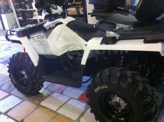 Polaris Sportsman Touring. ,  \,   