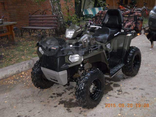 Polaris Sportsman Touring. ,  \,   