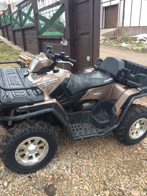 Polaris Sportsman X2 500. ,  \,   