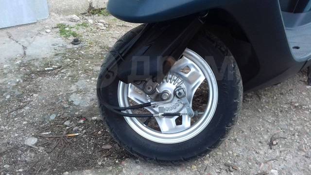 Как снять колесо скутера заднее хонда Honda Tact AF-30, 2002, 49 куб. см. 2х тактный, без пробега, исправен, 4 000 км,