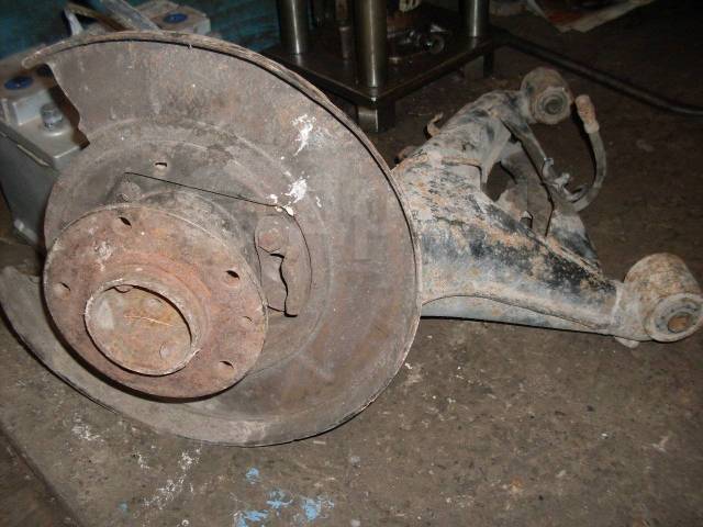 Задние рычаги е34