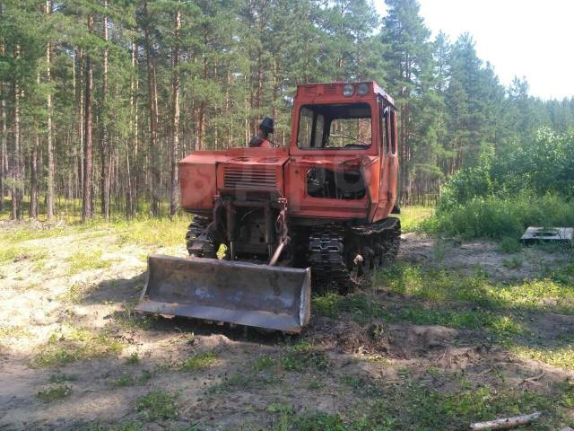 Трактор трелевочник фото