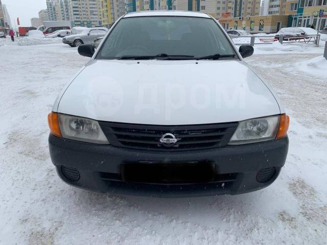 Авто под выкуп в барнауле. Ниссан Санни 1999. Ниссан Санни 1999 черный. Mazda familia 2002. Nissan Sunny 1999 на фоне ночи.