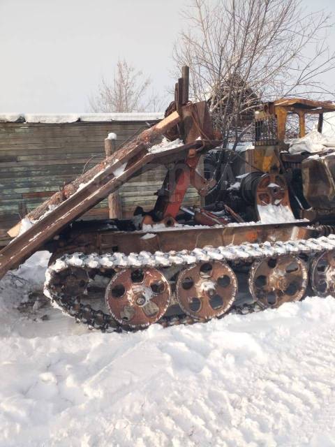 Трактор трелевочник фото