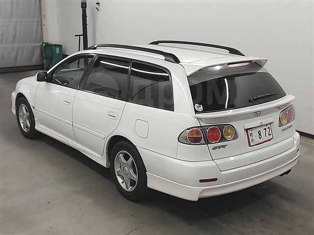 Тойота калдина б у. Toyota caldina st215w 3sgte. тойота калдина 2000 года. тойота калдина рестайлинг 2000.