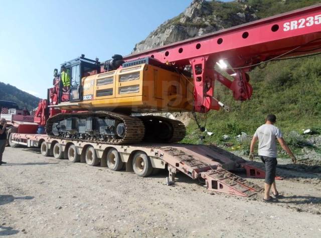 200 тонн в рублях. Sany sr235. Буровая установка sany sr235. Sany sr155 на трале. Роторная буровая установка sany sr235.