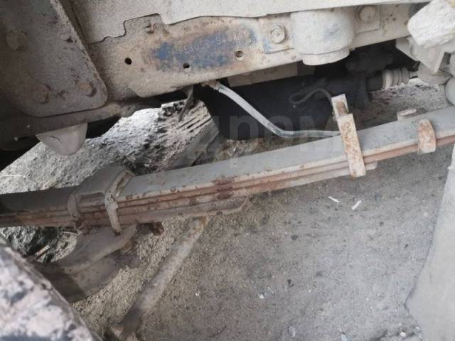 4.305. Отбойник рессоры Mitsubishi Fuso Canter fe325, 4d32. Mitsubishi Canter fe305 4d32 диски передние