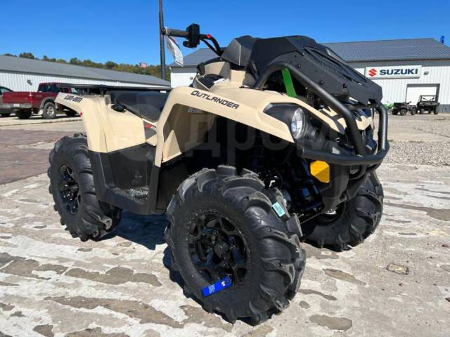 BRP Can-Am Outlander 570 X MR.  \,   