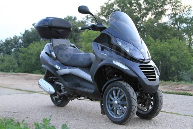 Трехколесный скутер 2010 Piaggio