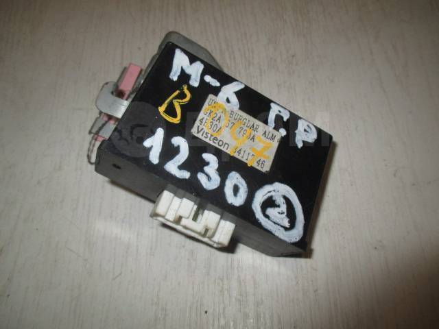 Блок сигнализации mazda 6 gg. Штатная сигнализация мазда 6. Штатная сигнализация мазда 6 gg 2005 год. Штатная сигнализация мазда 6. Блок управления штатным центральным замком мазда 6 gg.