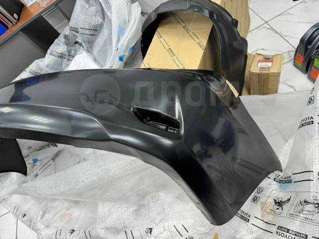 Бампер задний Toyota Corolla. Оригинал.