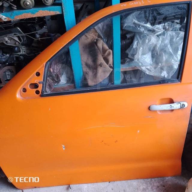 Дверь передняя левая L Volkswagen Caddy 2