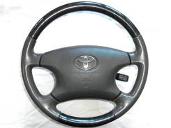 Оригинальный руль с косточкой под черное дерево Toyota в Томске Руль. Toyota: Allion, Windom, Allex, Aurion, Aristo, Ipsum, Verossa, iQ, Avensis, Estima Hybrid, Corolla, Altezza, Opa, Estima, Avensis Verso, Vista...