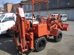 Hitachi, 2000 во Владивостоке Hitachi. Колесный эксковатор - фронтальный погрузчик