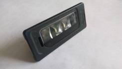 Фонарь подсветки гос. номера VAG AUDI VW Skoda (3AF943021A) в Томске Фонарь освещения номерного знака. Volkswagen: Caddy, Touareg, Passat, Jetta, Transporter, Ameo, Tiguan, Sharan, Touran, Golf, Polo Skoda: Superb, Fabi...