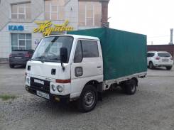 Nissan Atlas, 1990 в Новосибирске Nissan Atlas. (бортовой с тентом, кат. Б) продажа, Обмен, 2 000 куб. см., 1 000 кг., 4x2