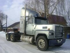 Freightliner, 1985 в Бийске Freightliner. Fredlainer, 12 000 куб. см., 30 000 кг., 6x4