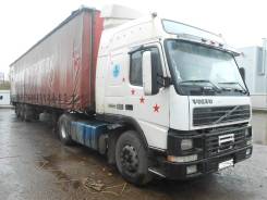 Volvo FM12, 1998 в Великом Новгороде Volvo FM12. и полуприцеп тентованный Vogelzang, 12 130 куб. см., 12 000 кг., 4x2