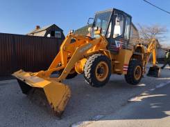 CAT WS500, 2004 в Уссурийске Caterpillar. Японский фронтальный погрузчик с экскаваторной установкой и ПСМ, 2 000 кг., Дизельный, 1,00 куб. м.