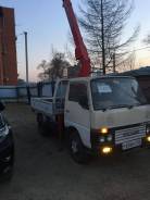 Nissan Atlas, 1992 в Уссурийске Nissan Atlas. Продаётся грузовик с манипулятором, 3 300 куб. см., 2 500 кг., 4x2