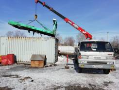 Mazda Titan, 1993 в Комсомольске-на-Амуре Mazda Titan. Эвакуатор с манипулятором, платформой и лебедкой., 3 500 куб. см., 3 450 кг., 4x2