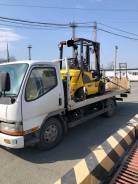 Mitsubishi Fuso Canter, 1995 во Владивостоке Mitsubishi Fuso Canter. Эвакуатор, сдвижная платформа, 4 200 куб. см., 3 000 кг., 4x2