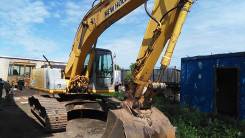 Kobelco, 2005 в Великом Новгороде Kobelco. Экскаватор гусеничный New Holland Kobelko E215, 1,40 куб. м.