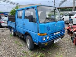 Nissan Atlas, 1992 во Владивостоке Nissan Atlas. 4WD, бортовой, категория В, один собственник., 2 700 куб. см., 1 500 кг., 4x4