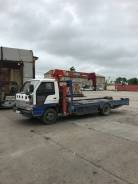 Isuzu Elf, 1996 в Уссурийске Isuzu Elf. Продается эвакуатор isuzu elf, 4 300 куб. см., 3 000 кг., 4x2