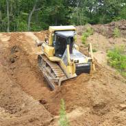 Komatsu D85EX-15, 2004 во Владивостоке Komatsu D85EX-15. Бульдозер ,2004, 11 040 куб. см., 28 000 кг.