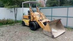 Komatsu SG10-3, 1990 во Владивостоке Komatsu. Фронтальный погрузчик, 1 000 кг., Бензиновый, 1,00 куб. м.