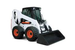 Услуги мини-погрузчика Bobcat с различным навесным оборудованием в Красноярске Услуги мини-погрузчика Bobcat с различным навесным оборудованием