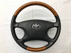 Оригинальный руль с косточкой под дерево Toyota в Томске Руль. Toyota: Windom, Allion, Allex, Aurion, Aristo, Verossa, Ipsum, Avensis, Estima Hybrid, Corolla, Altezza, Avensis Verso, Opa, Estima, Vista, Mark...