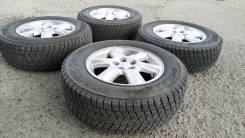 Комплект литых дисков Subaru 205/70R-15 c зимней резиной Bridgestone в Благовещенске Комплект литых дисков Subaru 205/70R-15 c зимней резиной Bridgestone. 6.0x15" 5x100.00 ET48 ЦО 56,1 мм.