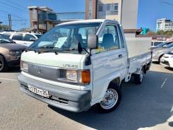Toyota Lite Ace, 2001 во Владивостоке Toyota Lite Ace. Бортовой, аппарель, длинный кузов, 1 хозяин., 2 000 куб. см., 1 250 кг., 4x2