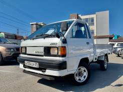 Toyota Town Ace, 1995 во Владивостоке Toyota Town Ace. 4вд, бортовой, не конструктор, 2 000 куб. см., 1 250 кг., 4x4