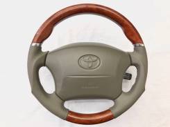 Анатомический руль "Silk Blaze" с косточкой дерево для Toyota в Томске Руль. Toyota: Land Cruiser, Land Cruiser Cygnus, Celsior, Land Cruiser Prado, Progres Lexus LS400, UCF20 Lexus LX470, UZJ100 Lexus LX450, FJZ80, FZJ80...