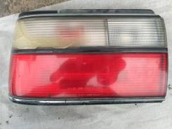 Задний левый фонарь Toyota Corolla AE91 12-327