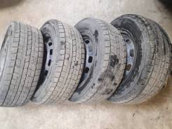Комплект зимних колес 195/65/14 Dunlop DSX на штамповке с колпаками