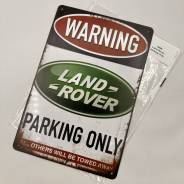    96 Land Rover parking only 